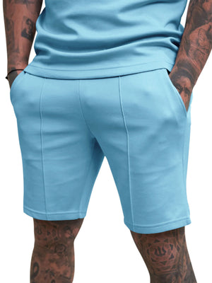 Light blue chino shorts with drawstring waist and stitched front detail.