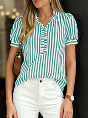 Ruffled puff sleeve blouse in green and white stripes with button front and ruffled neckline.
