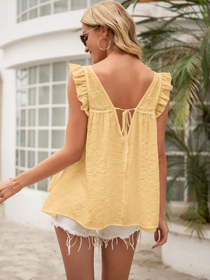 Light yellow ruffled yoke back-tie sleeveless blouse with lace trim