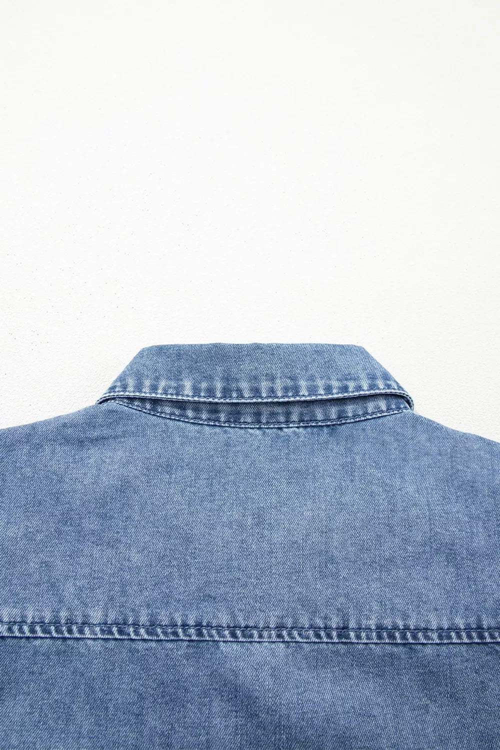 Denim maternity blouse with collared neckline and button-down detail