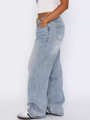 Light blue wide-leg denim jeans with contrast stitching and a relaxed fit.