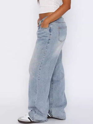 Light blue wide-leg denim jeans with contrast stitching and a relaxed fit.