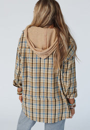 Textured plaid hooded overshirt with raw hem and tan waffle knit hood.