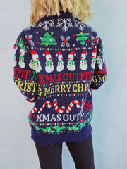 Dark blue acrylic knit sweater with Christmas graphic pattern, snowmen, candy canes, and text.