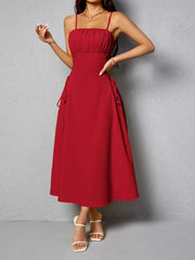 Deep Red cami dress with ruched bodice and crisscross lace-up sides.