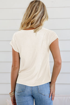 Ivory cowl neck cap-sleeve tee with a subtle ribbed texture.