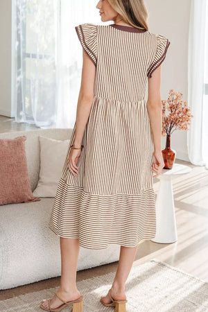 Striped plus size midi dress with tiered skirt and flutter sleeves.