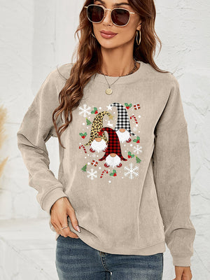 Beige corduroy sweatshirt with a gnome graphic featuring buffalo check, leopard print, and snowflakes.