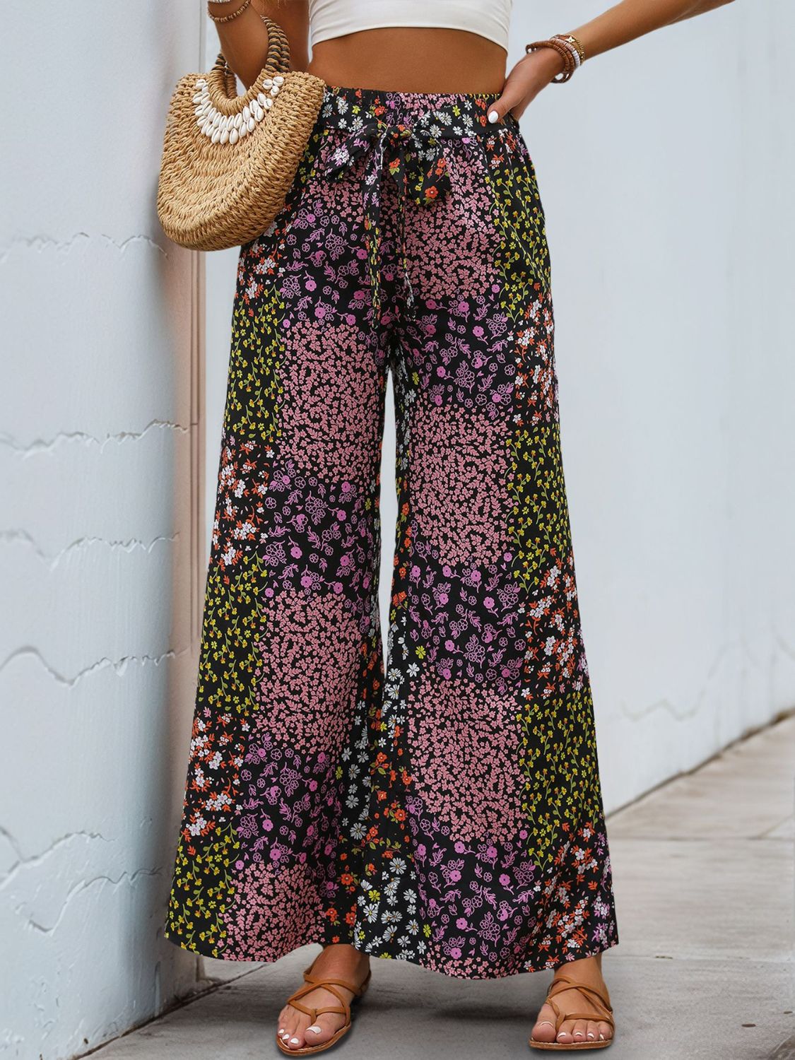 Black floral panel palazzo trousers with tie waist and wide leg