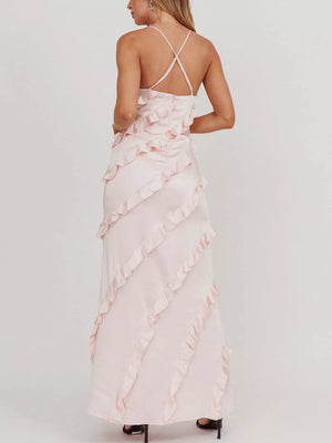 Blush pink ruffled spaghetti strap maxi dress with diagonal ruffle detailing.
