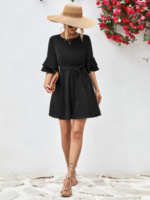 Black tiered sleeve tie-waist mini dress with a belted waist and A-line skirt.