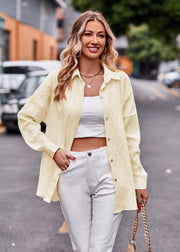 Textured overshirt in ivory with relaxed fit, buttoned front, and long sleeves.