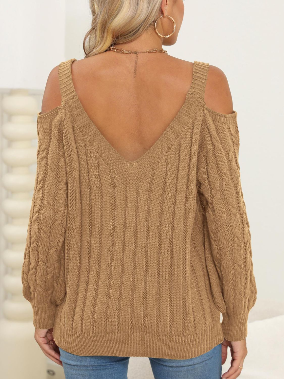 Camel open shoulder cable knit sweater with V-neck and ribbed detail