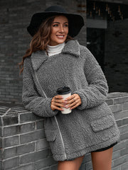 Gray teddy moto jacket with asymmetrical zip and pockets, collared, cozy fleece.