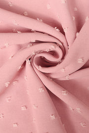 Dusty Pink Swiss dot blouse with tiered sleeves.