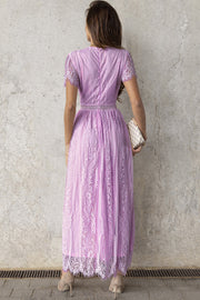 Lavender lace midi dress with short sleeves, scalloped hem, and beaded belt detail.