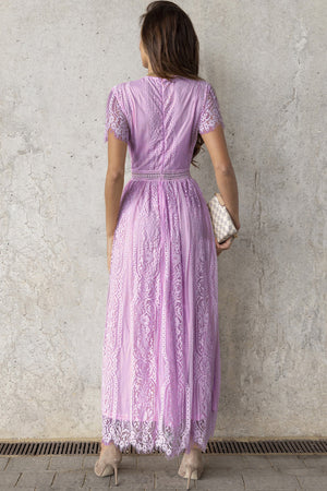Lavender lace midi dress with short sleeves, scalloped hem, and beaded belt detail.