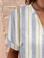 Bohemian tapestry henley blouse with vertical stripe pattern in French Blue and gold.