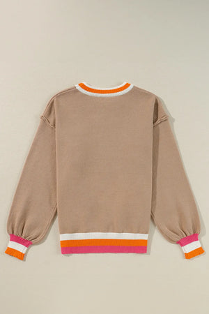 Dust Storm knit sweater with balloon sleeves and colorblock trim at neckline and hem.