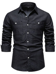 Black faded denim utility shirt with two chest pockets and button-up closure.