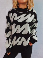 Graphic Wave Knit Sweater in black and white, with a mock neck and long sleeves.