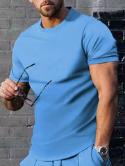 Men's light blue crew neck t-shirt, short sleeves, casual basic style cotton undershirt.