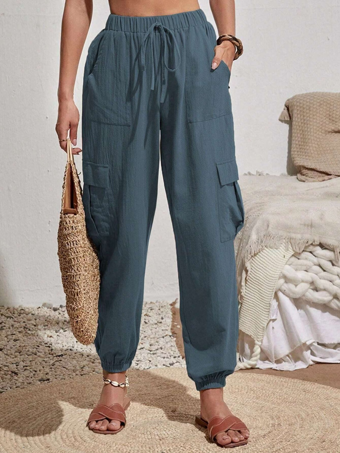 Textured Dusty Blue cargo lounge trousers with drawstring waist and elastic cuffs.