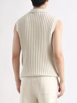 Apricot ribbed knit zip-up tank with collar and sleeveless design.