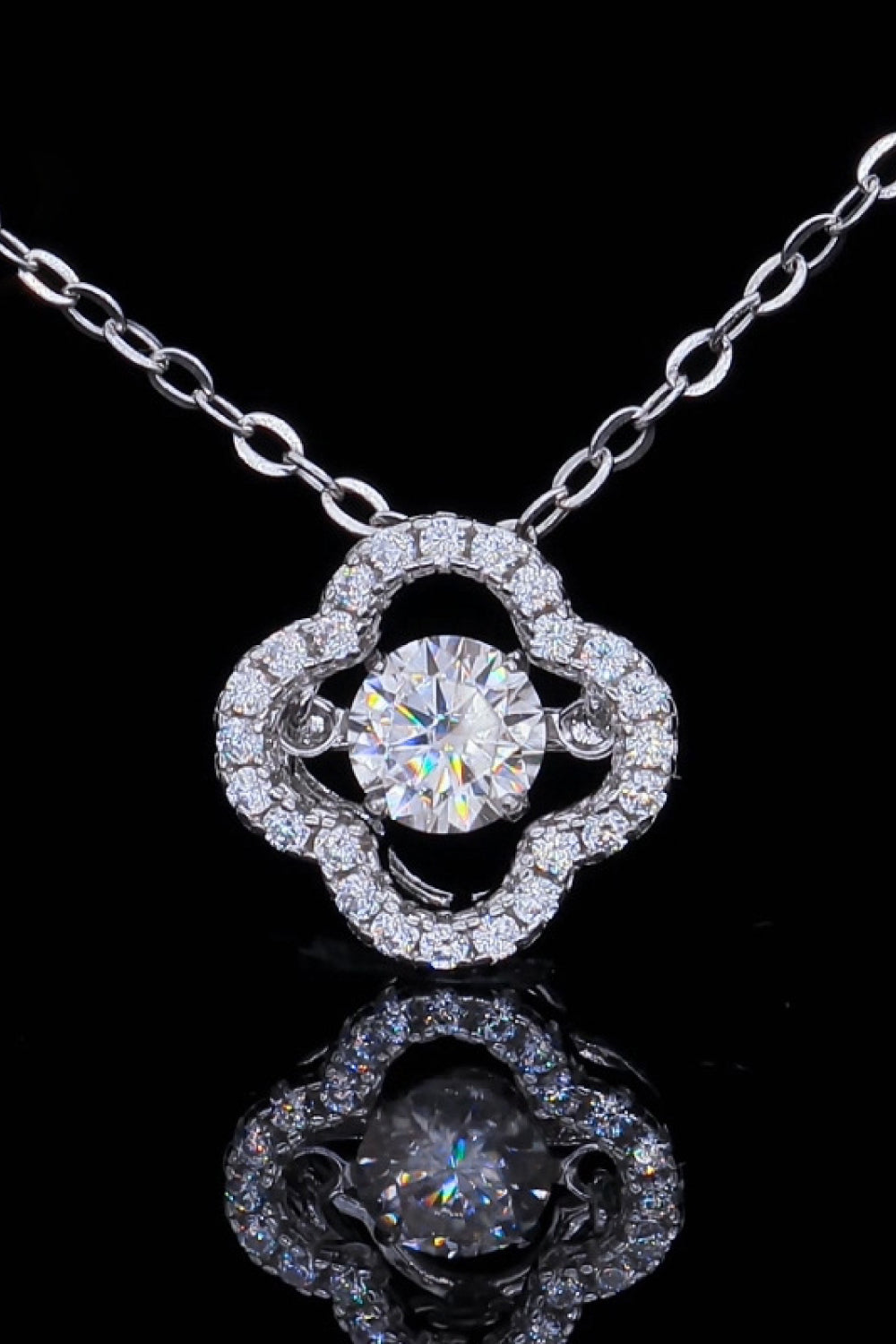 Silver clover cut moissanite pendant necklace with pavé accents.