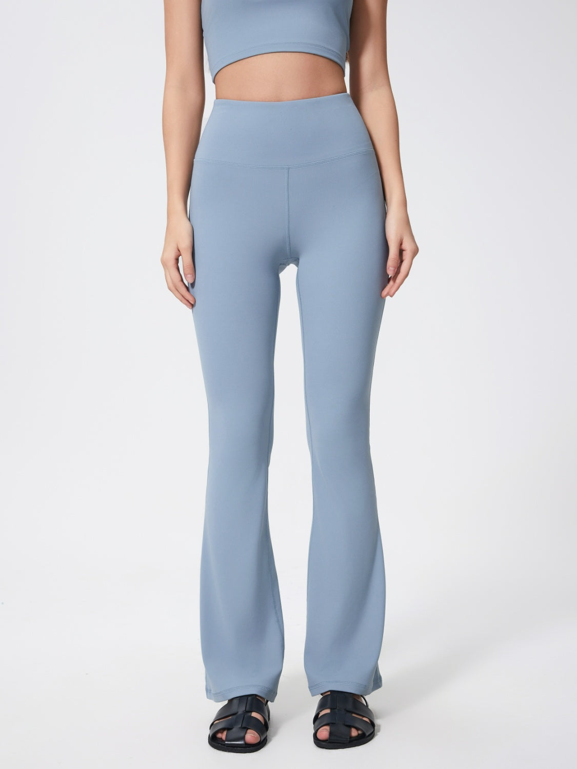 Flared sculpt leggings in light blue with a high-rise waist.