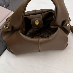 Adjustable Strap Crossbody Bag in Brown, model styling view