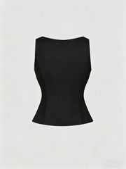 Black tailored vest with a scalloped hem and darted waist.