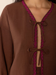 Brown linen tie-front pajama top with scalloped trim and tie closures