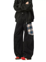 Black wide-leg sweatpants with plaid patchwork detail