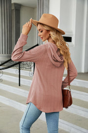 Textured henley hooded tunic in dusty pink with long sleeves and a relaxed fit.