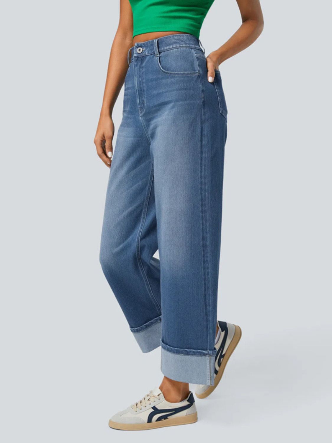Wide-leg denim jeans in medium wash with a contrast cuff, shown cuffed.