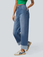 Wide-leg denim jeans in medium wash with a contrast cuff, shown cuffed.