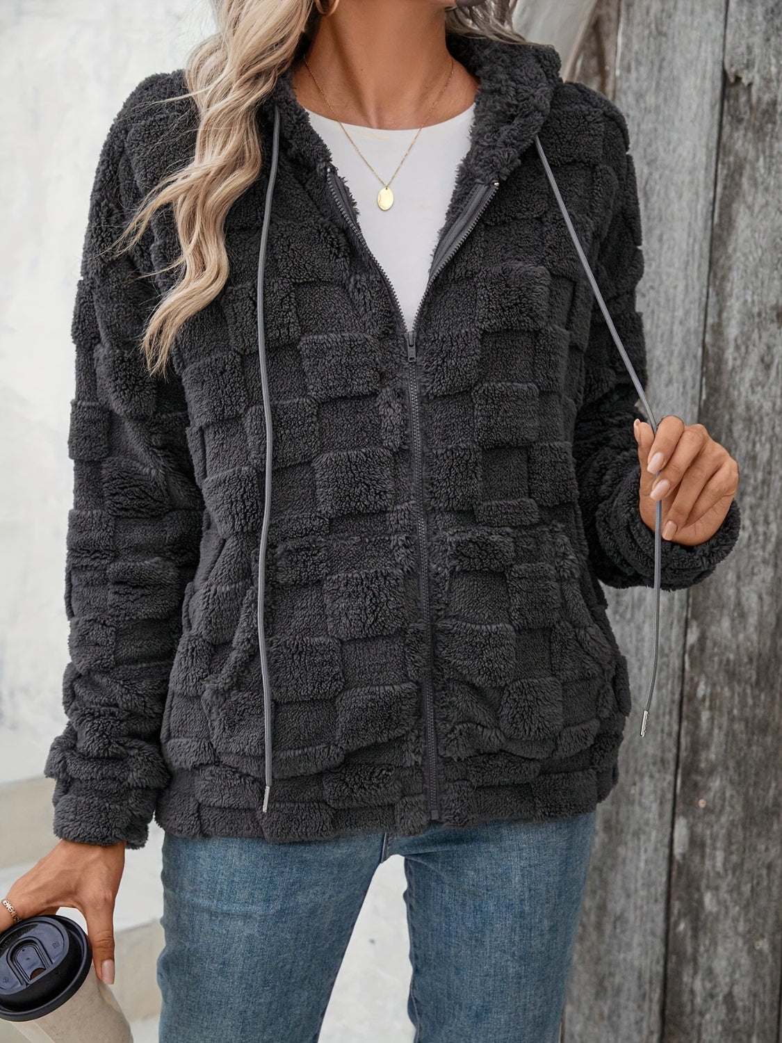 Dark gray textured grid fleece hoodie jacket with adjustable drawstrings and zip-front closure.