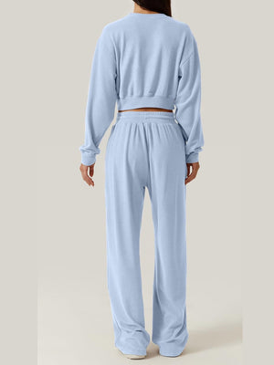 Light blue knit lounge set with cropped sweatshirt and wide-leg pants