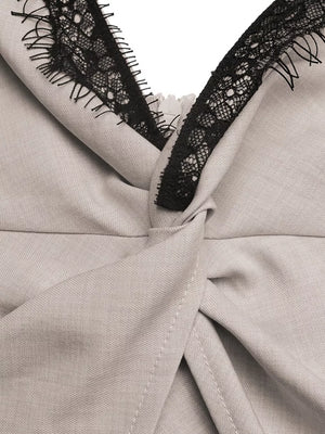Luxe cami top in light gray with black lace trim and twisted knot detail
