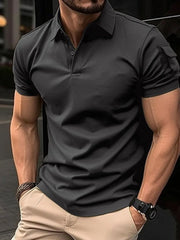 Black tactical polo shirt with buttoned placket and chest pocket detail.