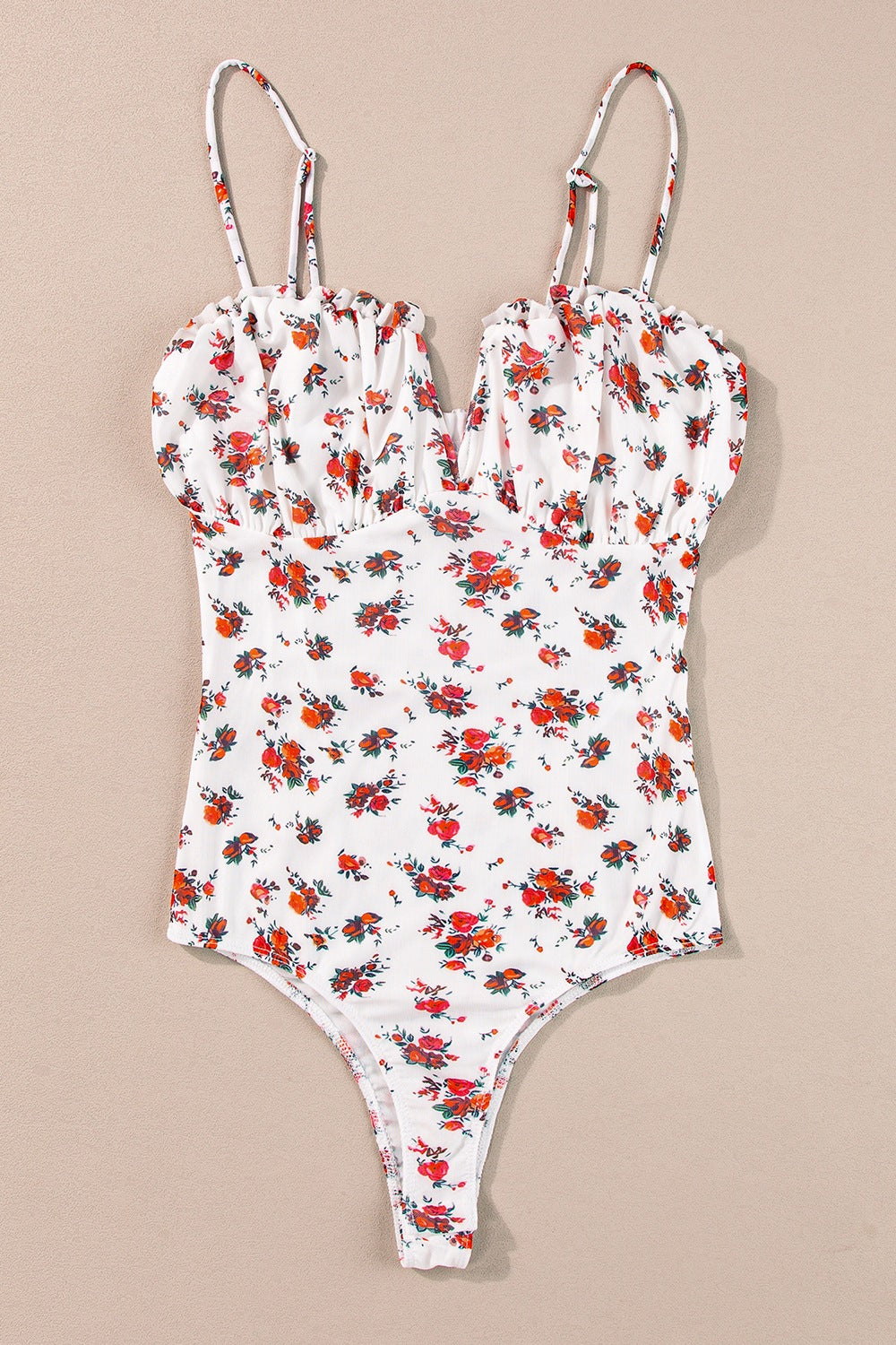 White floral bustier camisole with ruffle trim and adjustable straps