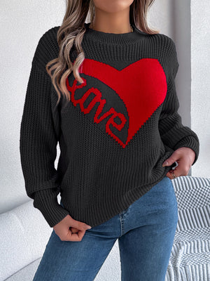 Black knit sweater with red heart and love graphic, crew neck, long sleeves.