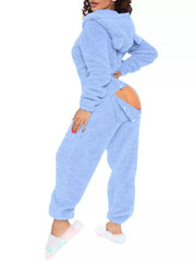 Blue fleece hooded romper with open back and button detail.