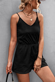 Black V-neck drawstring romper with adjustable spaghetti straps and a cinched waist.