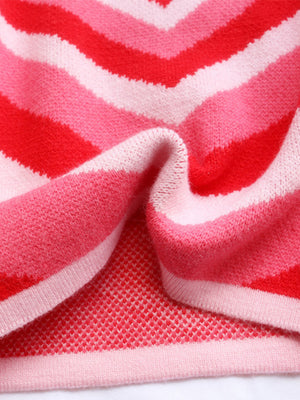 Heartbeat Stripe Mock Neck Knit sweater in pink and red chevron stripes.