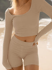 Textured ribbed scoop neck set in Dust Storm, Blue, Black, Cream, Moss, Rust, Taupe, Burgundy, Dark Blue, or Green.