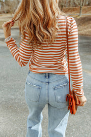 Ribbed stripe slim-fit turtleneck sweater in Stripe color with long sleeves.