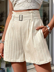Beige pleated texture belted shorts with a square buckle and cuffed hem.