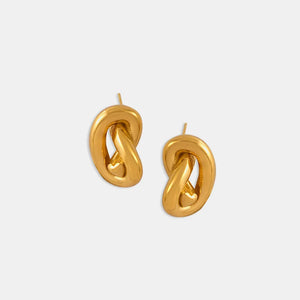 Gold sculptural knot stud earrings with a polished finish.